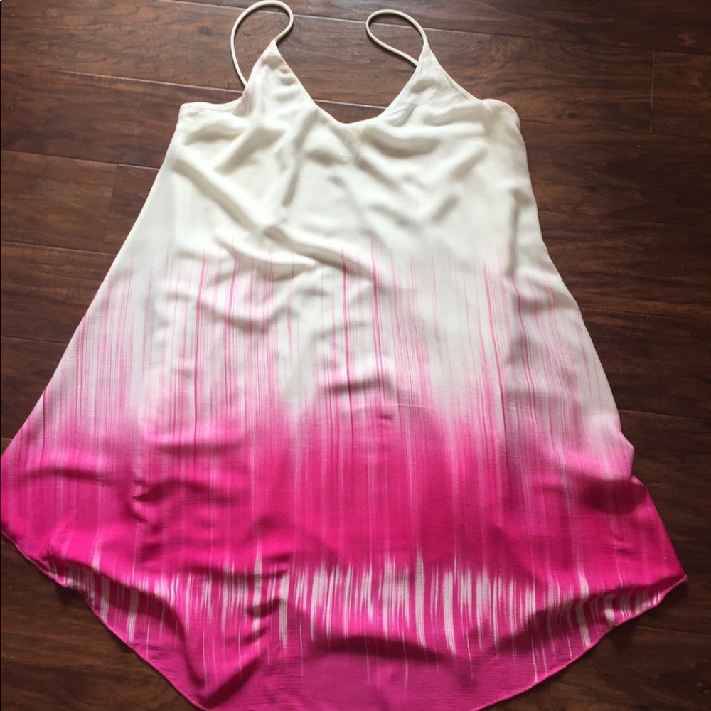 Women’s cream/pink dress.